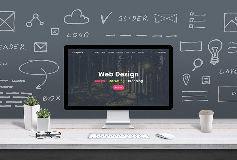 Auf einem Bildschirm steht Web Design auf einem grauen Hintergrund